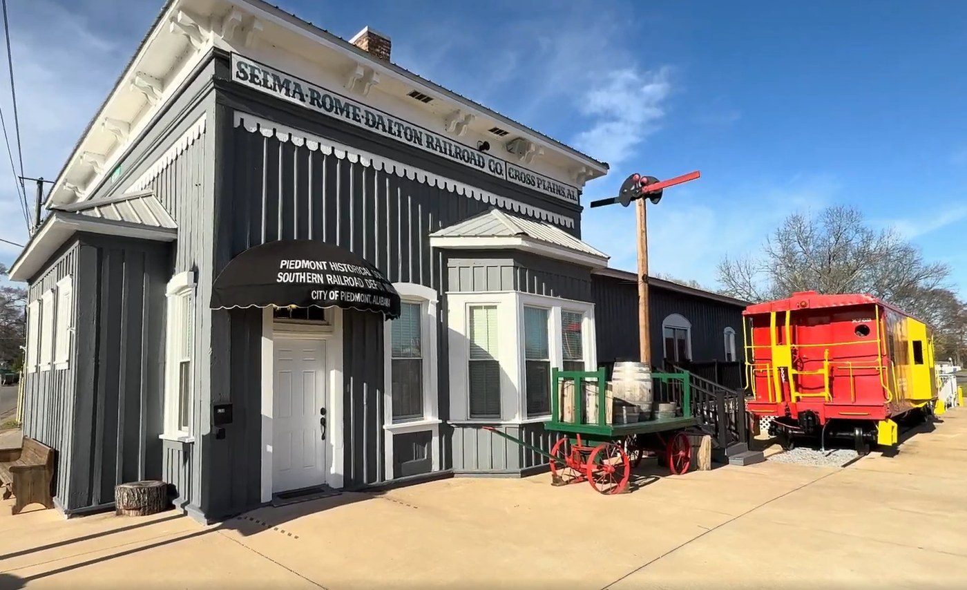 The depot exterior with the caboose