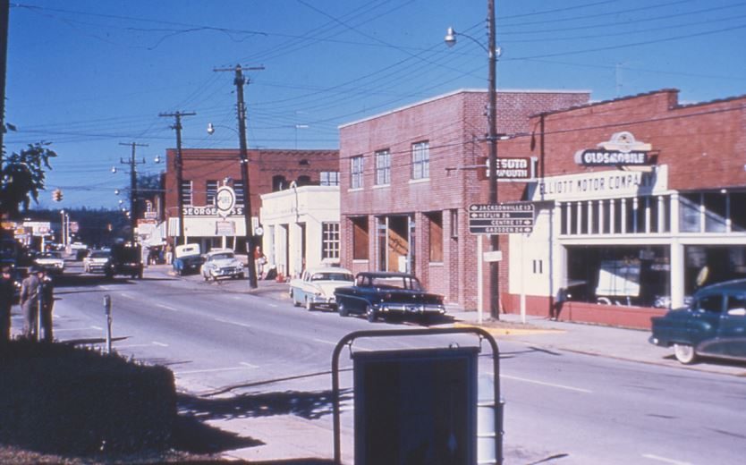 East Ladiga Street in color with the Elliott Motor Company Oldsmobile dealership