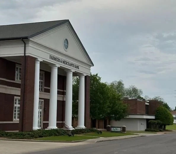 The columned Farmers and Merchants Bank building today