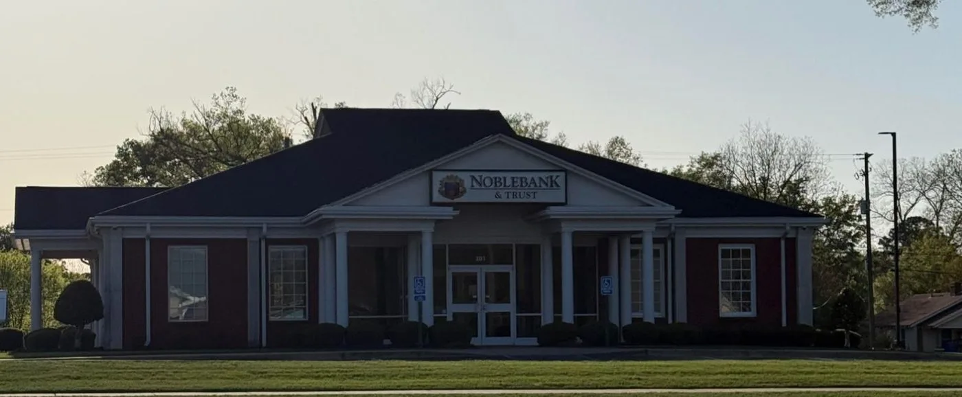 The brick Noblebank and Trust branch building