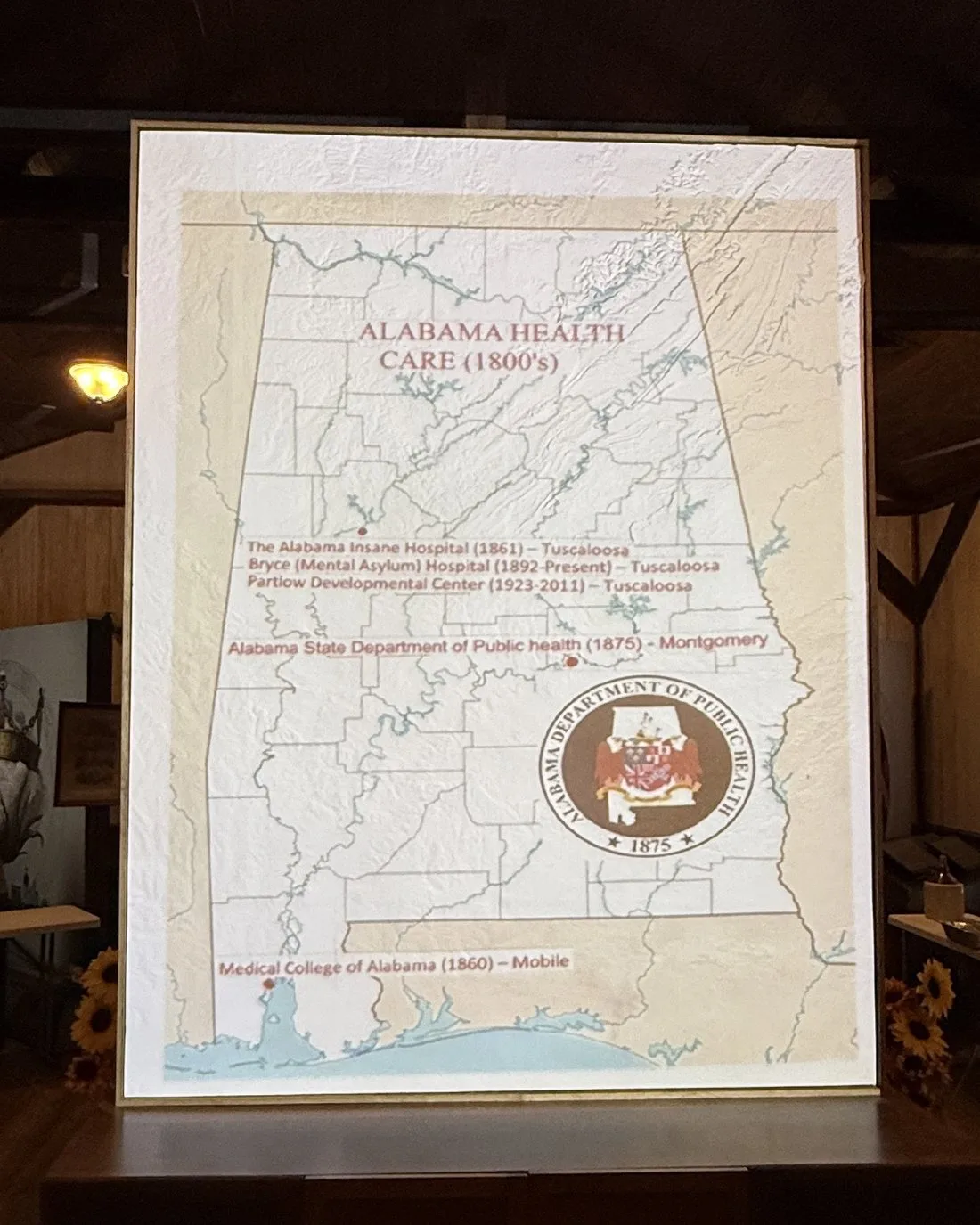 The interactive topographic map of Alabama, displayed upright in the Cargo Room